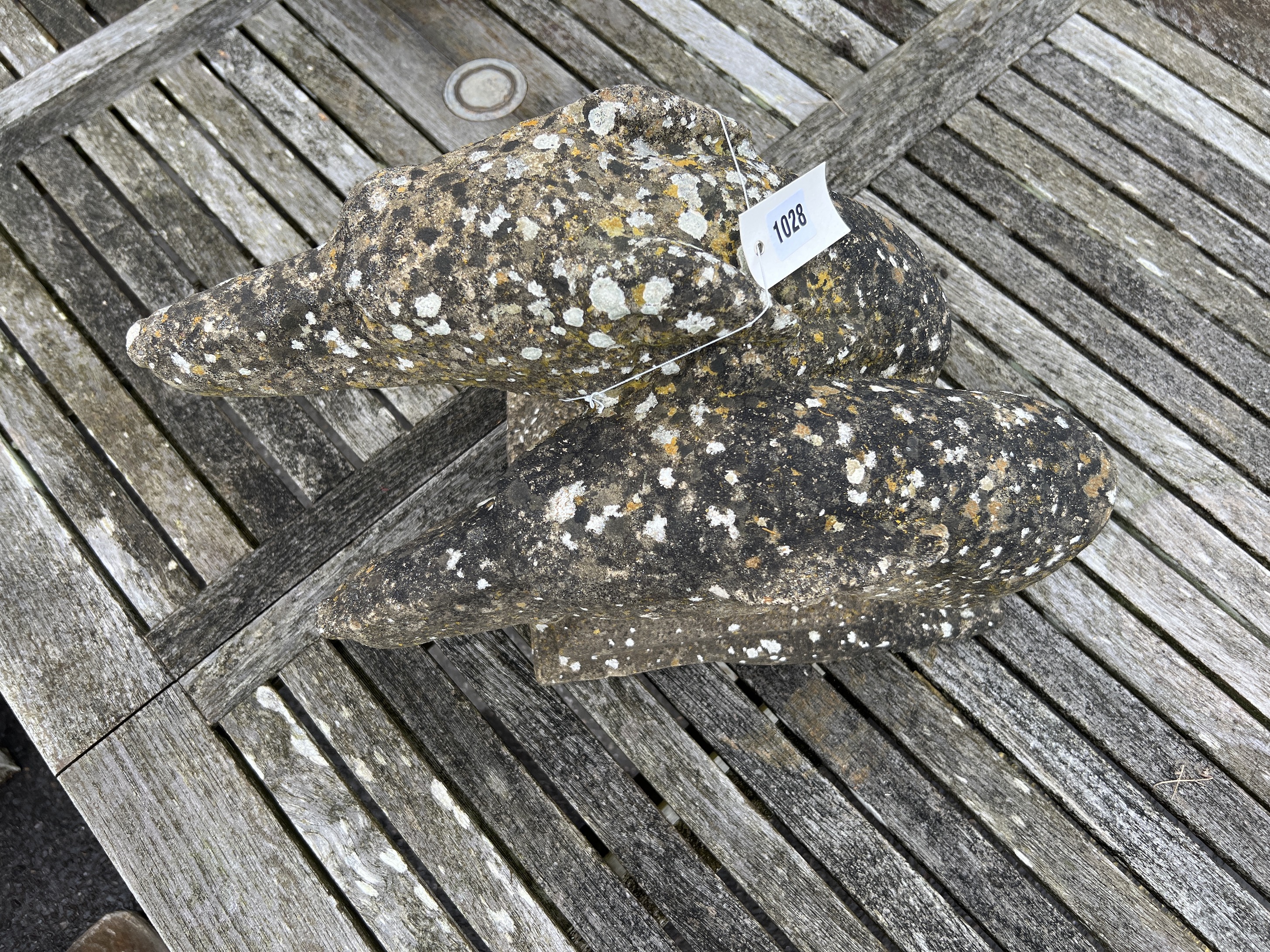 A reconstituted stone double greyhound head garden ornament, width 36cm, depth 23cm, height 28cm